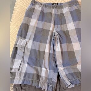 Boys size 16, Black Jack, blue checked board/cargo shorts.